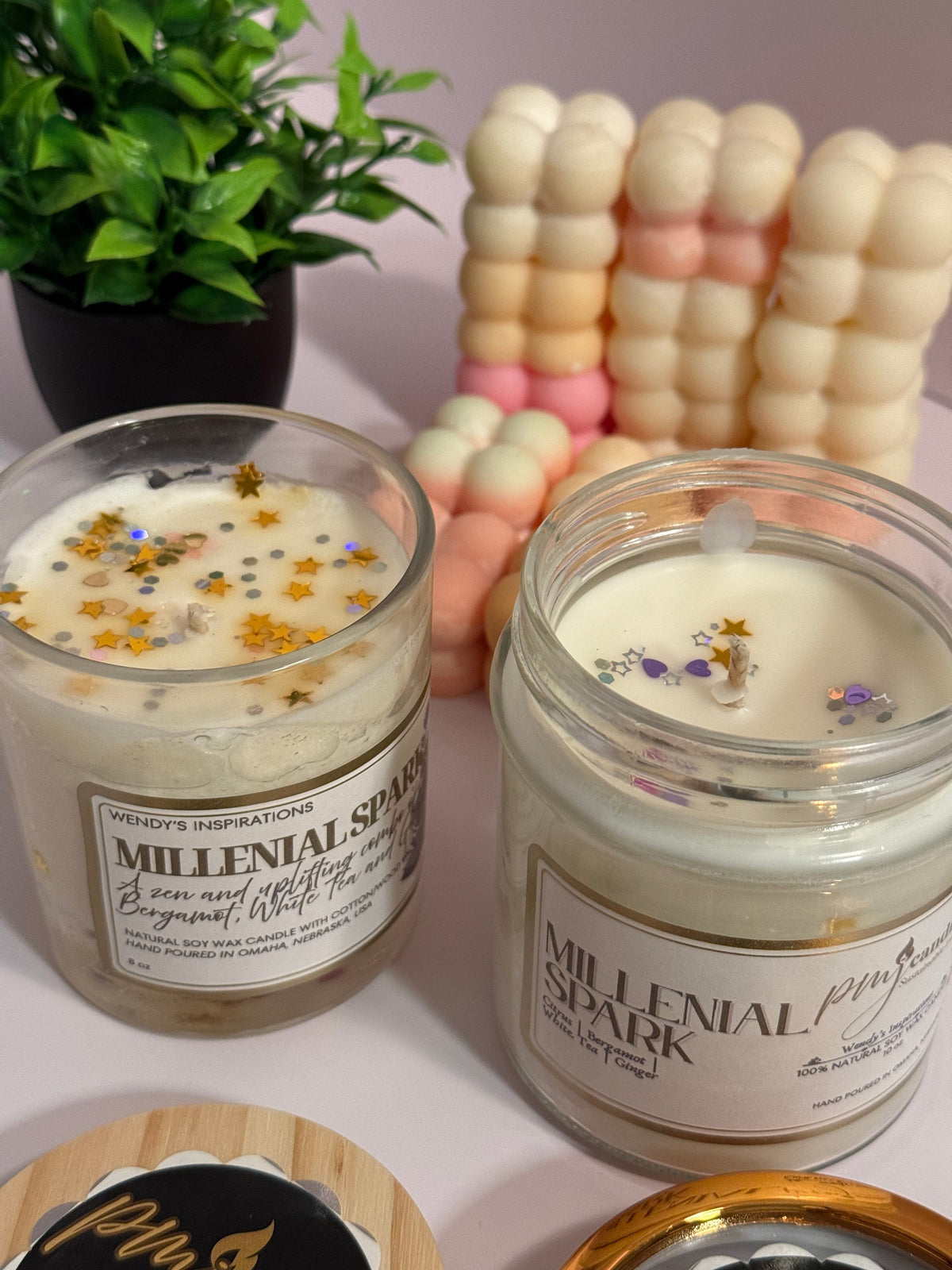 PMJ Candles Millenial Spark soy wax candles in glass jars with star-shaped glitter and citrus ginger scent